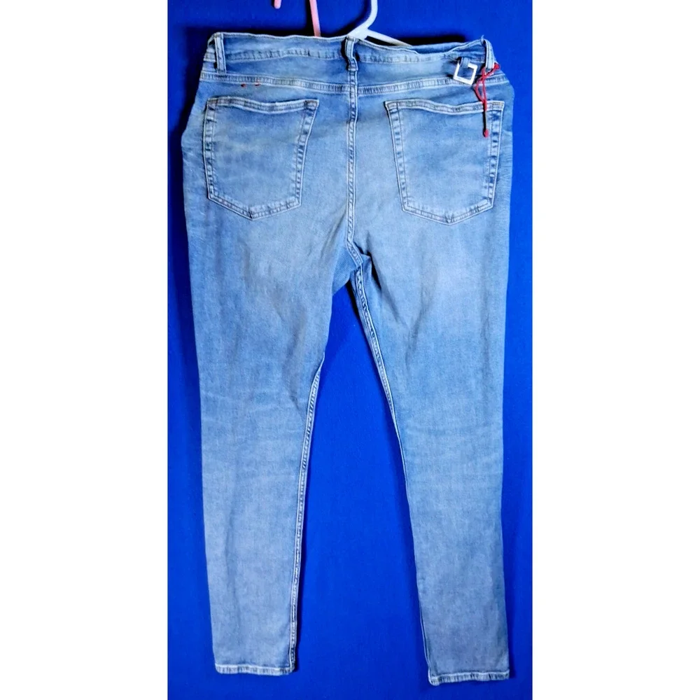 Art Meets Chaos Donwan Harrell Mens Distressed Skinny Jeans Blue Button Fly 38